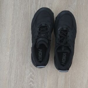 Black Hoka sneakers